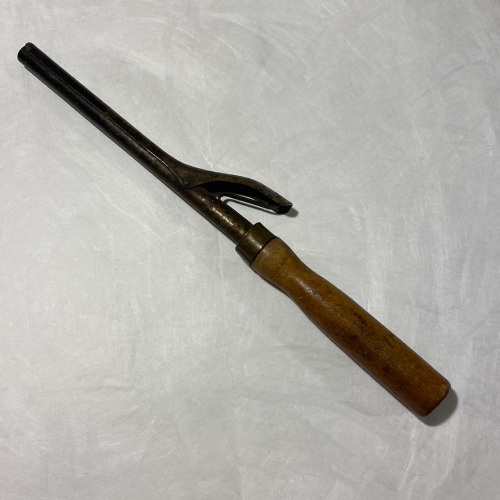 Antique curling iron